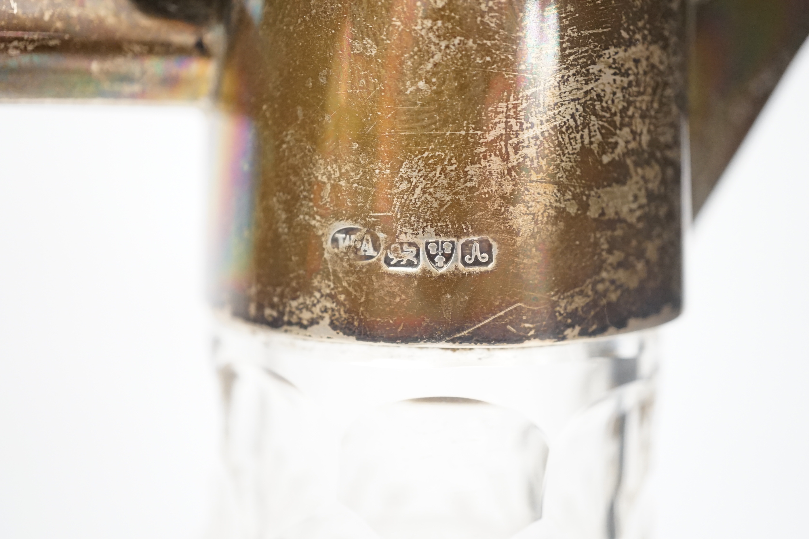 Two early 20th century silver mounted glass claret jugs, William Henry Leather, Birmingham, 1901 and William Aitken, Chester, 1901, tallest 24.2cm.